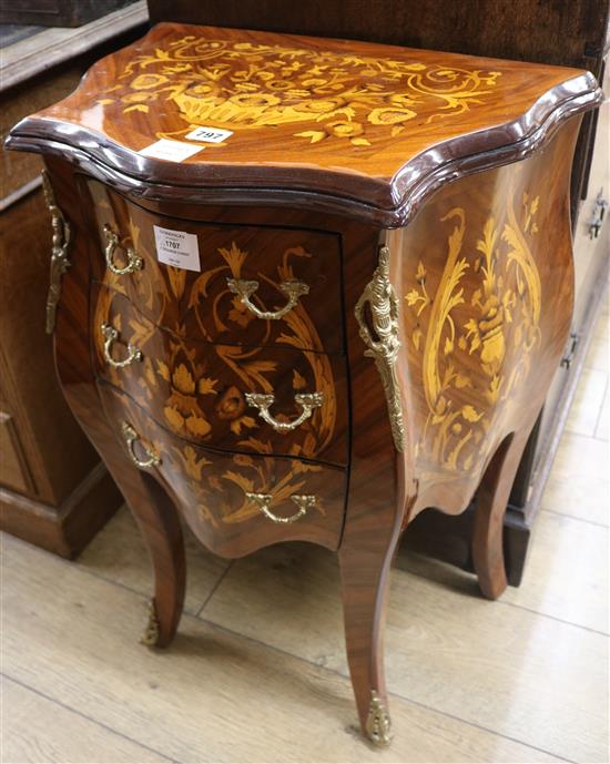 A Louis XV style marquetry bombe shaped three drawer chest, H.73cm